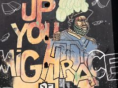 06A Up you mighty race mural of Jamaican hero Marcus Garvey by Patasha McLean and Jordanne Brady Paint Jamaica street art in Kingston Jamaica